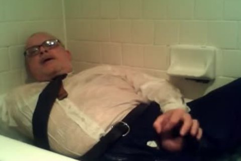 Pants Shirt And Tie And Shoes  And Socks In Tub With cum