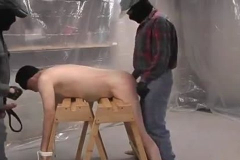 Masked lad hammering White bald.