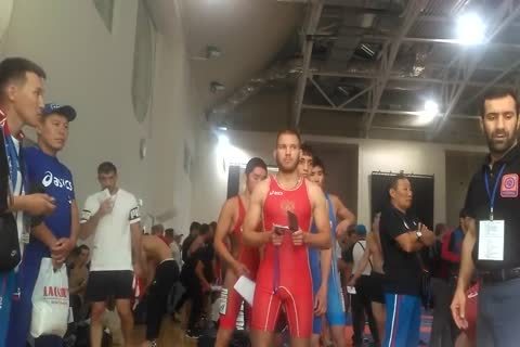 Middle Eastern boys Weigh-in previous to Wrestling Tournament