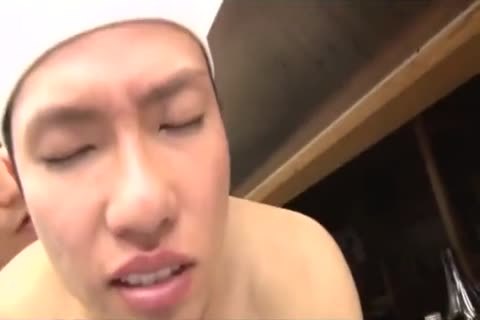 Sushi Chef bare In Kitchen