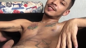 BarebackLatinoz - Stiff Juan stroking on sofa
