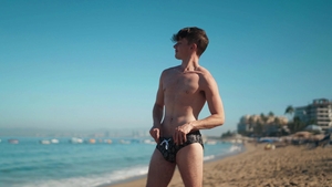 Men: A Foursome On A Warm Beach
